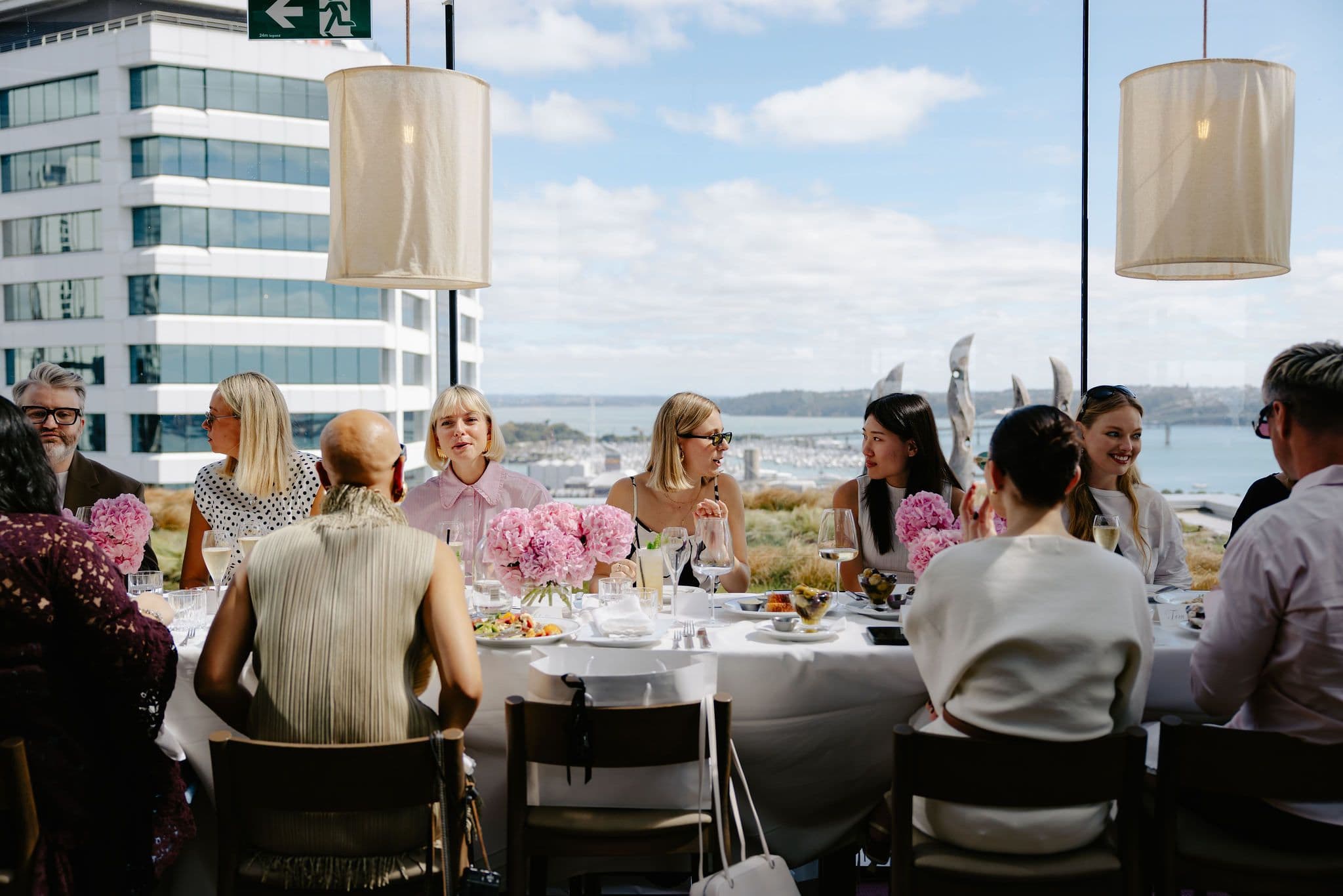 Kate Spade rooftop lunch in Auckland, guests and the room, event photography by Sonna Studios